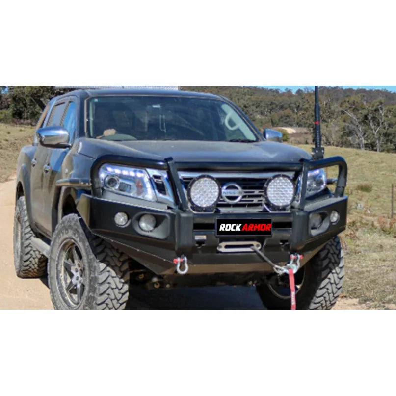 Black Nissan Navara with aftermarket bumper featuring Rockarmor Brushbar in premium steel