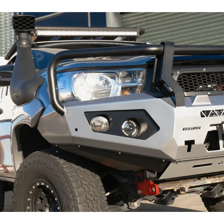 Silver truck with off-road modifications featuring Rockarmor GT Bull Steel Hoop Bullbar and driving lights