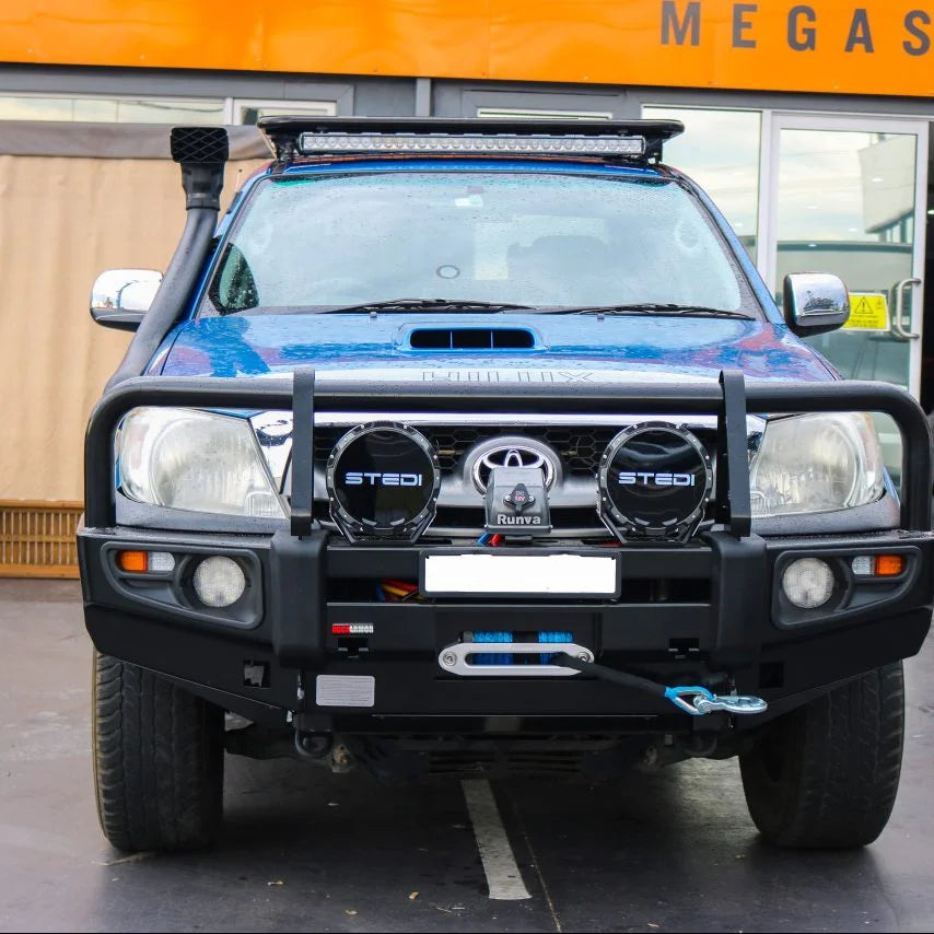 Blue off-road Toyota Hilux with Rockarmor premium steel bullbar for N70 2005-2011