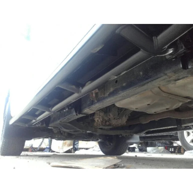 Underside view of Isuzu Dmax steel checker plate Rockarmor side steps installation