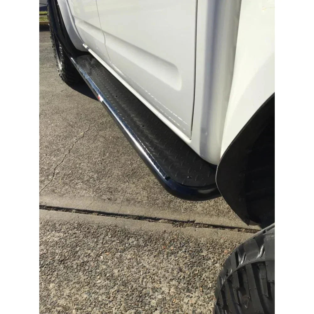 Black rockslider steel running board with steel checker plate for Nissan Navara D40 side steps, rear view