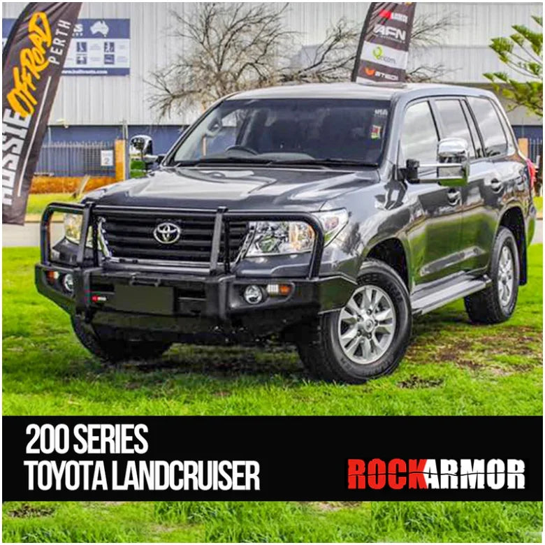 Gray Toyota Landcruiser equipped with rockarmor premium steel bullbar featuring fog lights and vehicle suspension suit Toyota