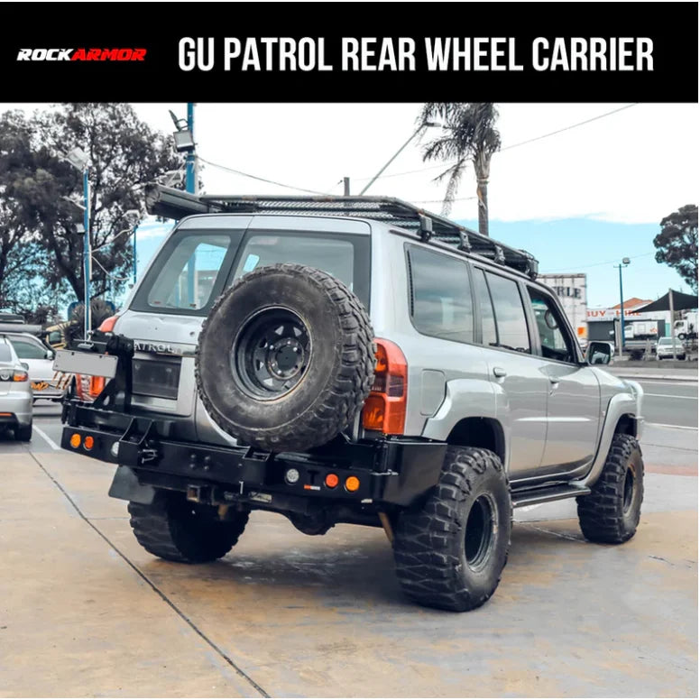 Rear view of silver nissan patrol y61 fitted with rockarmor steel dual wheel carrier for 2004 to 2016 models